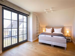 Reetland am Meer - Premium Reetdachvilla mit 2 Schlafzimmern, Sauna und Kamin E13