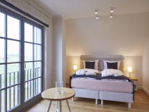 Reetland am Meer - Premium Reetdachvilla mit 2 Schlafzimmern, Sauna und Kamin E22