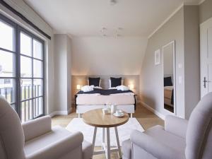 Reetland am Meer - Premium Reetdachvilla mit 3 Schlafzimmern, Sauna und Kamin E18