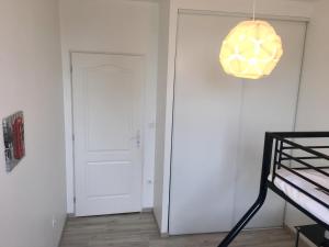 Appartements Proche de Walibi,Appartement 4 personnes tout confort au calme : photos des chambres