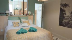 Appartements T2 G dans maison en centre ville avec jardin ideal couple curistes : photos des chambres