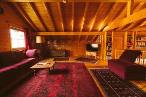 Malerisches Holzhaus "Coco" mit Kamin, Sauna und eigenem Garten