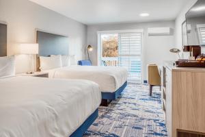 Queen Room with Two Queen Beds and Balcony room in Creekside Inn Downtown