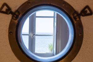 Il Mare di Camogli da un oblò by Wonderful Italy