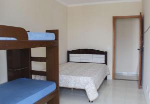 A011 - Apto com churrasqueira e 2 vagas de garagem