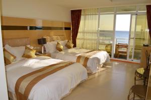 Phòng 4 người có Ban công và Nhìn ra Biển (Quadruple Room with Balcony and Sea View)