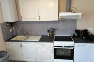 Appartements Gite Le 101eme dans le centre de Ste Mere Eglise : photos des chambres