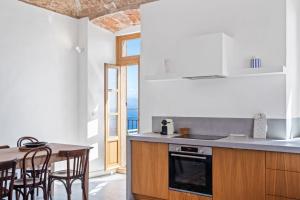 Appartements Cargese, appartement de charme surplombant le port : photos des chambres