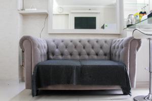 Comfort 2BR Bassura City Apartment near Shopping Center By Travelio