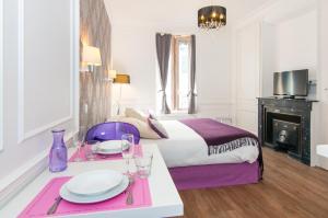 Appartements Les Charmettes du 6eme - Aulyondort : photos des chambres