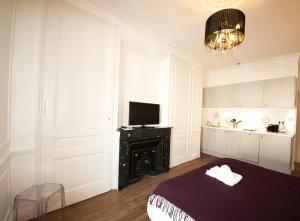 Appartements Les Charmettes du 6eme - Aulyondort : photos des chambres