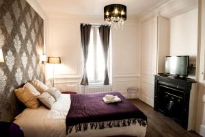 Appartements Les Charmettes du 6eme - Aulyondort : photos des chambres