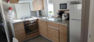 Campings Assist' Mobil Home 463 - Beau Mobil Home 6 personnes 3 chambres coin calme : photos des chambres