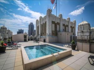 Apartment room in Spacious 2BR condo with great roof plus parking by CozySuites
