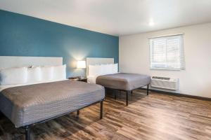 Standard Queen Room with Two Queen Beds - Non-Smoking room in WoodSpring Suites Bradenton