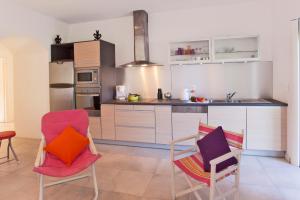 Appartements Casa Estel - Blue apartment in downtown of Erbalunga : photos des chambres