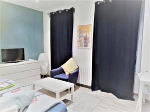 Appartements APPARTEMENT PROCHE CENTRE VILLE, GARE ET AUTOROUTE : photos des chambres