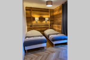 Appartements Gite avec jacuzzi privatif : photos des chambres