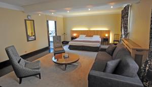 Hotels Le Grand Hotel : photos des chambres