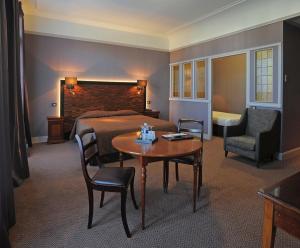 Hotels Le Grand Hotel : photos des chambres