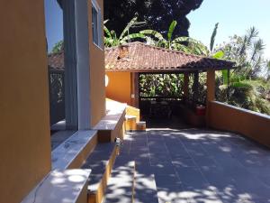 Honey Moon - Vista do mar na cama.