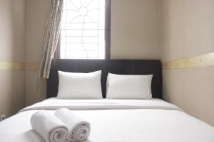 Strategic & Cozy 2BR at Majesty Apartment near Maranatha Christian University By Travelio