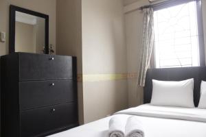 Strategic & Cozy 2BR at Majesty Apartment near Maranatha Christian University By Travelio