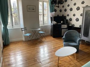 Sejours chez l'habitant Suite privative dans maison de caractere : photos des chambres