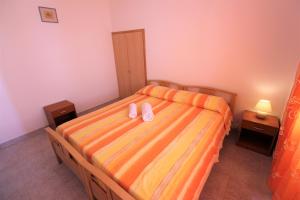 Trilocale arancione climatizzato con terrazza panoramica