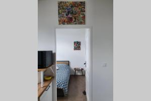 Appartements Vol de nuit - balade urbaine au centre d'Epernay : photos des chambres