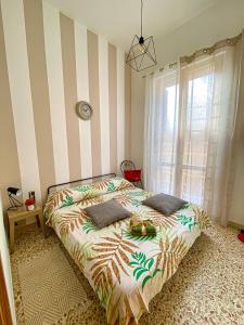 Appartamento in centro storico con ampio terrazzo sul mare