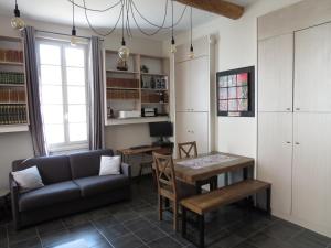 Appartements Appartement avec jardin privatif : photos des chambres