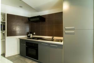 Appartements Florella Achard Apartment : photos des chambres