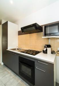 Appartements Florella Achard Apartment : photos des chambres