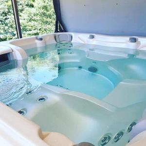 Appartements Gite ma vie la avec jacuzzi privatif : photos des chambres