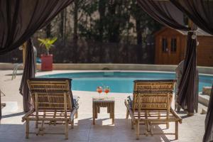 Maisons de vacances El Sama-In , Piscine chauffee : photos des chambres
