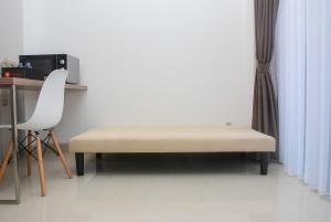 Modern 1BR at Ciputra World 2 Apartment By Travelio