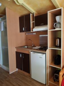 Complexes hoteliers Camping La Pinede : photos des chambres