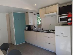 Complexes hoteliers Camping La Pinede : photos des chambres