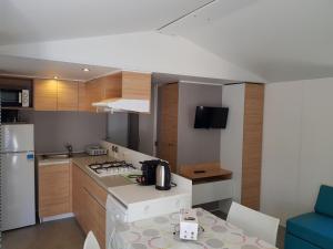 Complexes hoteliers Camping La Pinede : photos des chambres