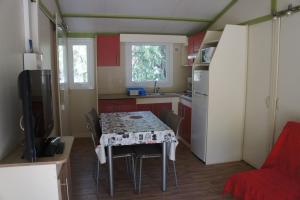 Complexes hoteliers Camping La Pinede : photos des chambres