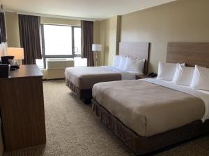 Superior Queen Room with Two Queen Beds room in Astoria Delancy Inn & Suites