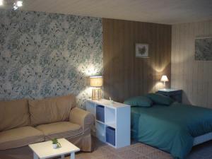 Maisons d'hotes Au p'tit jardin : photos des chambres