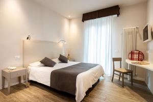 Comfort Double or Twin Room with Partial Lake View - Annex room in Hotel Marconi