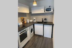 Appartements Joli T2, jacuzzi, jardin et parking prives, metro : photos des chambres