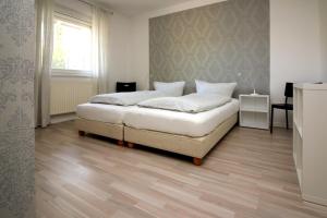 Am Apfelgarten-2 Apartments mit PKW-Parkplatz, Flörekeweg