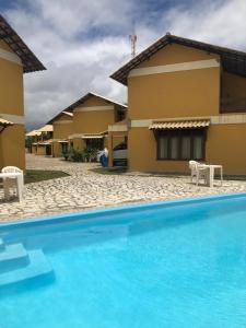 Casa de praia em condomínio à beira mar