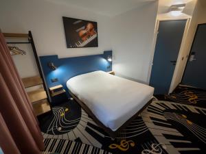 Hotels Welcomotel Beauvais Aeroport : photos des chambres