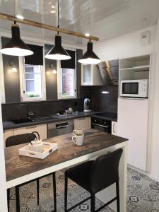 Appartements L'escale - Appartement en centre ville : photos des chambres
