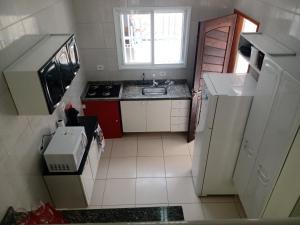 Lindo sobrado a 100 m praia do Aruan.